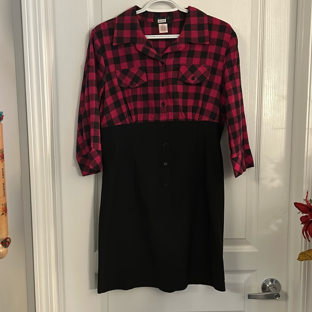 Dress pink and blk plaid top,bottom half blk . Adjustable back laced in ribbon